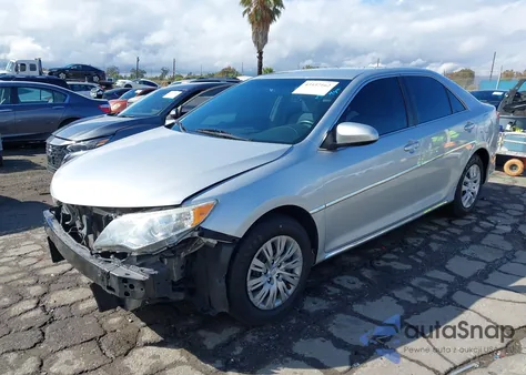 2014 Toyota Camry Le z USA, uszkodzony, nr VIN 4T1BF1FK6EU406107